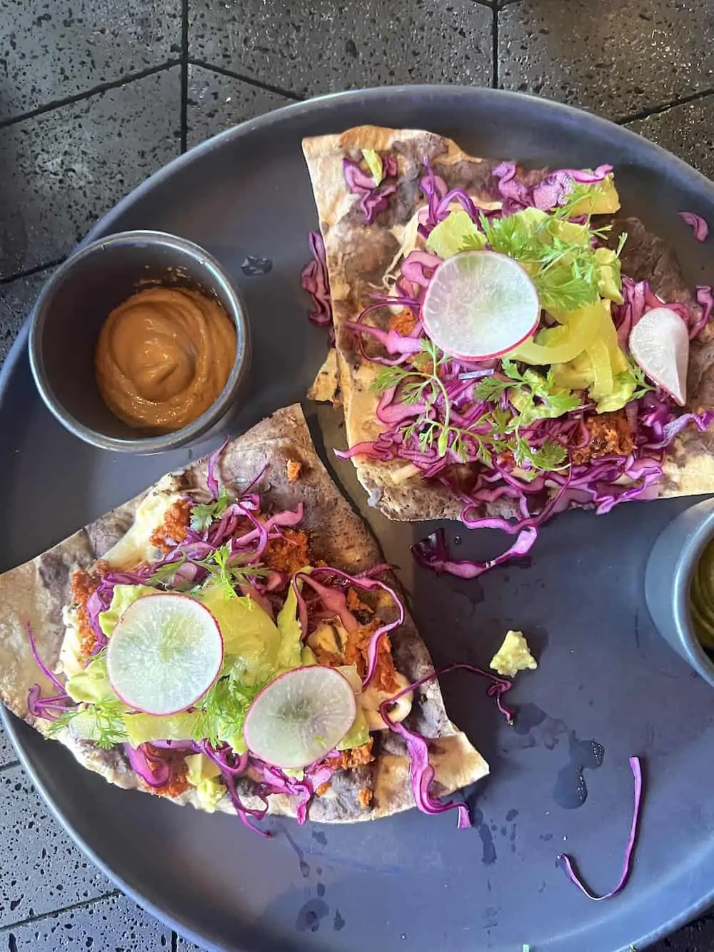 Fresh and healthy tlayuda served at the cantina restaurant at Hotel Xcaret Arte.