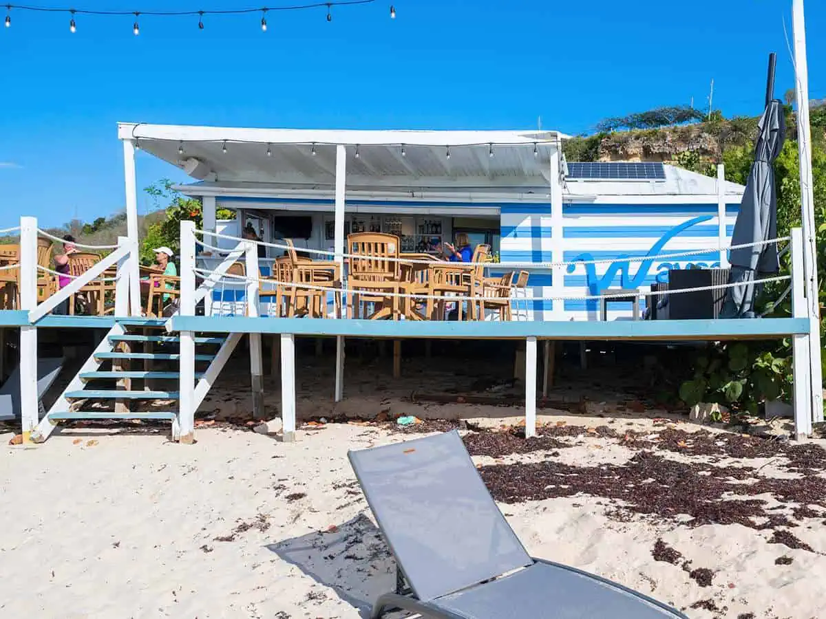 Beach bar with chairs and tables.