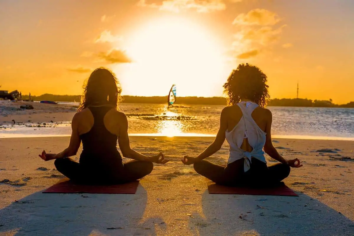 Two women doing yoga on Bonaire. 