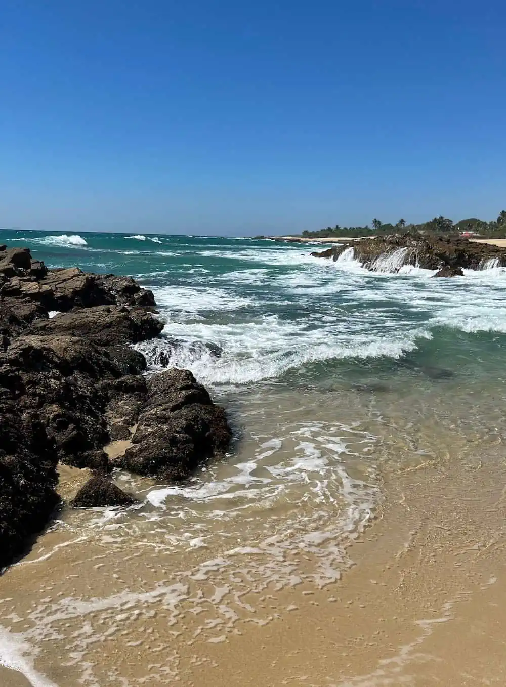 Agua Blanca means "White Water" which perfectly describes the cresting waves. 